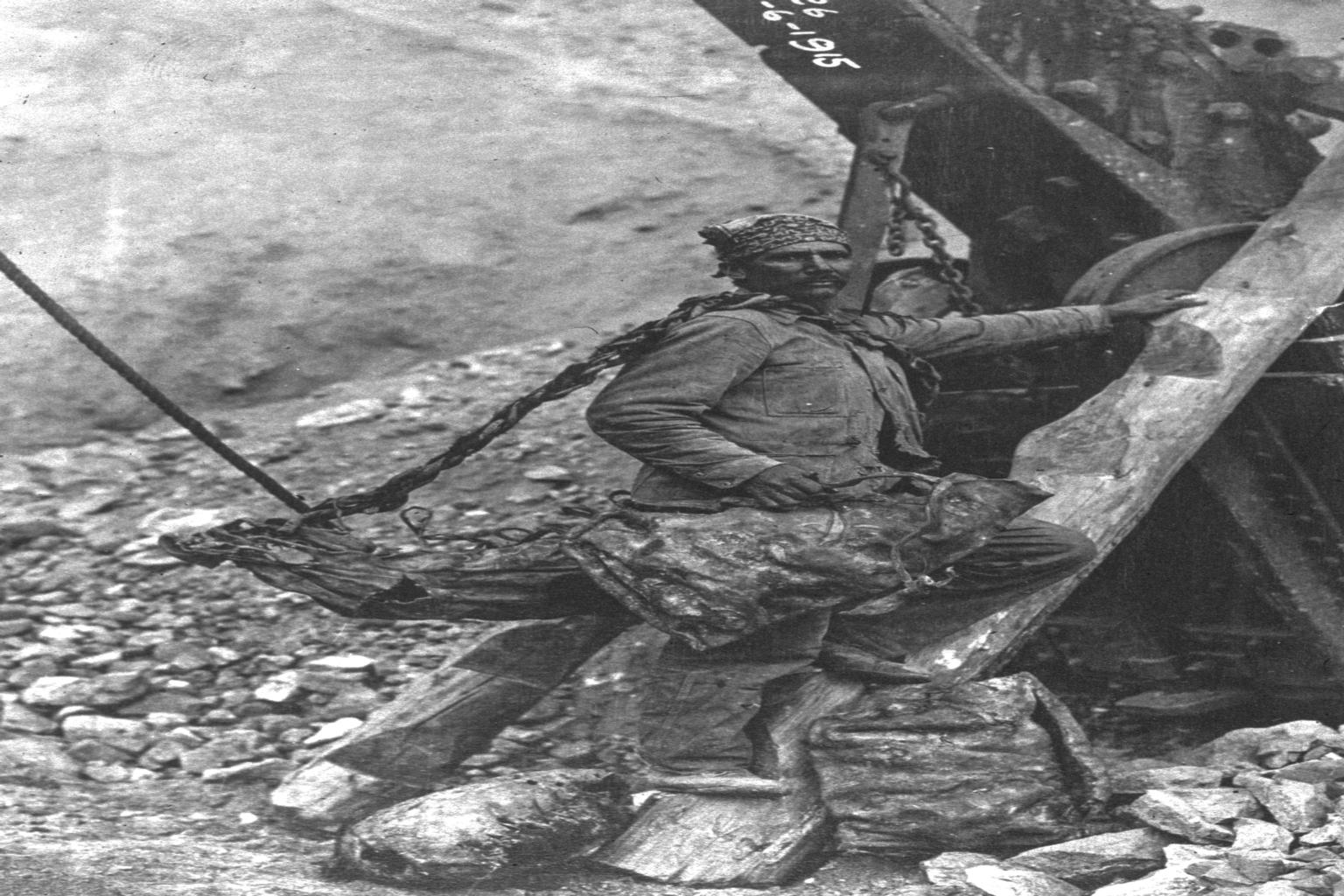 Miner working with machinery in Santa Rita, New Mexico, 1915.